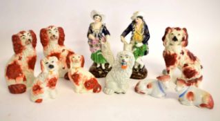 Collection of Staffordshire dogs and two Staffordshire type figures (10)