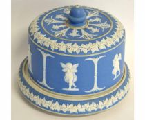 Wedgwood style pottery cheese dish and cover, decorated in white slip with applied decoration of