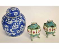 Chinese porcelain ginger jar decorated with prunus on a blue ground with four character mark to