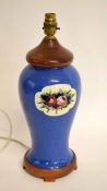 Moorcroft early 20th century pottery vase, the powder blue ground with a Persian style decoration,