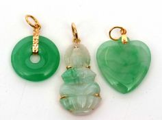 Mixed Lot: modern jadeite heart pendant, pierced circular pendant together with a figure (3)