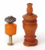 Amber coloured snuff bottle of inverted baluster form with flared foot and carved integral rings