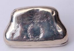 Early 20th century hallmarked evening purse, of shaped and hinged form with engraved decoration,