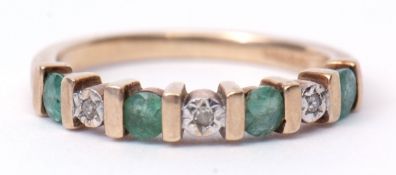 Diamond and emerald half eternity ring, features 4 circular cut emeralds between 3 small diamonds,
