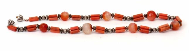 Early 20th century white metal, coral and glass bead necklace, a design featuring coral tubular