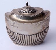 Edward VII oval tea caddy of half fluted oval form with hinged cover and cast and applied