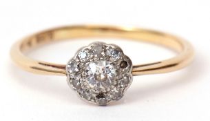 Diamond cluster ring, the centre diamond 0.10ct approx, surrounded by 10 small single cut