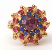 Modern yellow metal cluster ring, set with a synthetic alexandrite, sapphires and rubies, basket