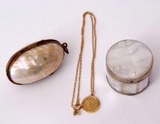 Mixed Lot: gilt, brass and freshwater pearl mounted canister of oval form with hinged body and