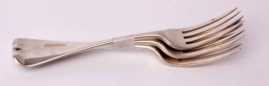 Three George III Old English pattern dinner forks, crested verso, length 20cms, combined weight
