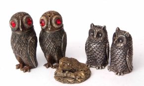 Mixed Lot: two pairs of base metal pepper casters, each modelled in the form of owls, together