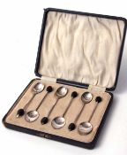 Cased set of six coffee spoons each with plain polished bowls, wire work handles and coffee bean