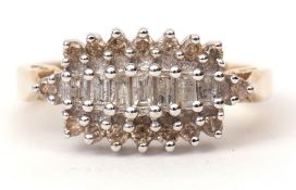 Modern 9ct gold diamond and cluster ring, having a central row of six graduated baguette diamonds