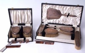 Mixed Lot: Elizabeth II cased six-piece dressing table set comprising hand mirror, two hair brushes,