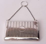 George VI silver mounted evening purse of hinged rectangular form with engine turned decoration