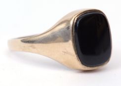 9ct gold and onyx panelled signet ring, the shaped rectangular onyx panel set in a plain polished