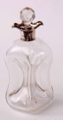 Early 20th century silver mounted and clear cut glass "glug-glug" decanter of typical waisted form