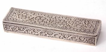 Far Eastern white metal pencil case of rectangular form with heavily chased floral and foliate