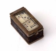 19th century brass cased set of miniature dominoes, the hinged rectangular case with glazed panel to