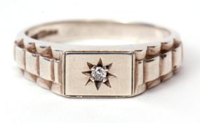 White metal and small diamond ring, the plain polished rectangular panel features a small