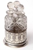 Edward VII silver mounted decanter set comprising a circular coaster base with ribbon and swag