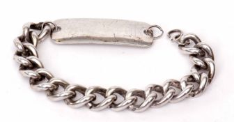 Hallmarked silver identity bracelet, the heavy gauge curb link bracelet supporting a rectangular