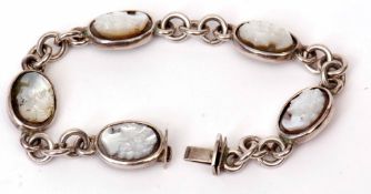 White metal hardstone cameo bracelet, the design featuring five oval cameos depicting a maiden's