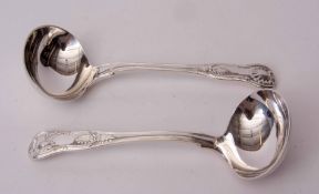 Two George IV Kings pattern sauce ladles each with oval honeysuckle bowls, London 1823 and 1824,