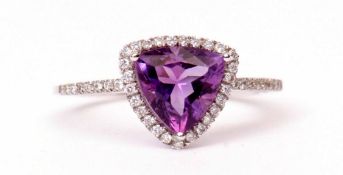 Modern trillion cut amethyst and diamond halo ring, stamped 750, size M