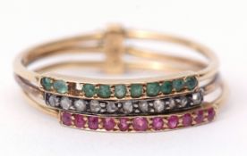 Vintage "stacking rings", a design of three precious gem set thin bands joined as one featuring a