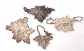Mixed Lot: decanter labels, each fashioned as a naturalistic vine leaf and all with pierced