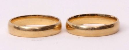 Mixed Lot: two 750 stamped plain polished wedding rings, 7.8gms
