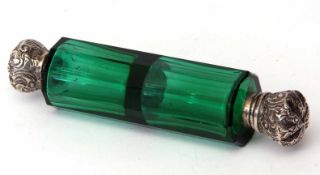 Late 19th century green glass double ended scent bottle of faceted cylindrical form with foliate