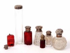 Mixed Lot: six various silver lidded toiletry bottles including two ruby glass scent bottles (both