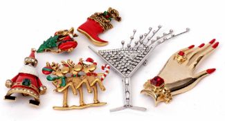Collection of "Butler & Wilson" brooches to include a boxed clear crystal champagne glass, a gilt