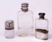 Mixed Lot: hallmarked silver mounted and clear cut glass hip flask with screw down cover and pull