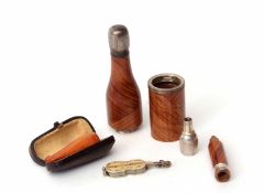 Mixed Lot: smoker's pipe modelled in the form of a champagne bottle, together with an amber coloured