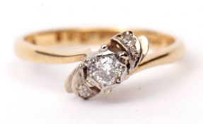18ct gold diamond cross-over ring, the brilliant old cut diamond 0.10ct approx, between small