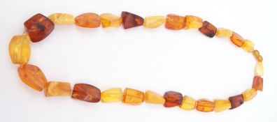 Modern amber necklace, shaped rectangular beads to a pressed Bakelite amber screw clasp, 300mm drop