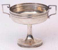 George V two-handled pedestal bowl, of circular form with pierced rim, stylised applied side handles