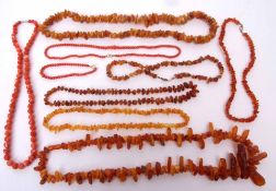 Mixed Lot: antique coral bead necklace and bracelet, sponge coral bead necklace, two long rows of