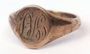 9ct gold gent's signet ring, the oval panel engraved with a monogram, hallmarked Birmingham 1960,