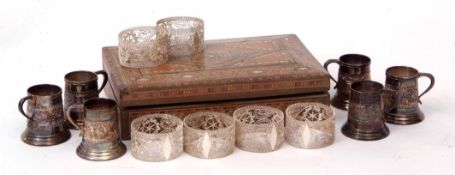 Mixed Lot: six small spirit cups or tankards, each of tapering circular form with embossed detail