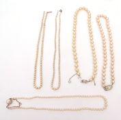 Mixed Lot: four simulated pearl necklaces