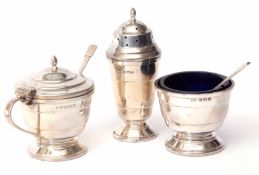 George VI three-piece cruet set comprising open salt, lidded mustard and pepper caster, each of