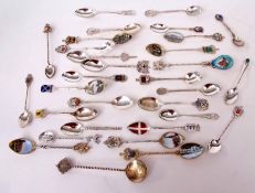 Mixed Lot: eleven various British souvenir type tea spoons, together with a further 21 white metal