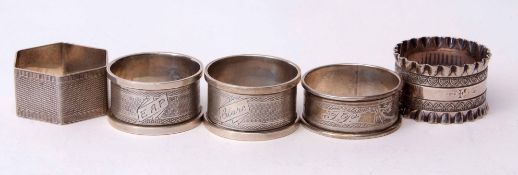 Mixed Lot: pair of cylindrical napkin rings with engine turned decoration and initialled