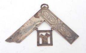 Victorian part Masonic jewel, modelled as an engraved set-square with ring suspension and