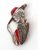 Art Deco style white metal brooch, a lady wearing a hat being slightly tilted, decorated and