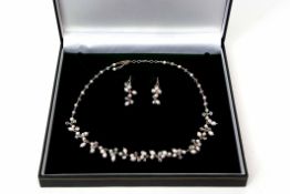 Cased white metal crystal and seed pearl necklace, matching earrings, stamped 925